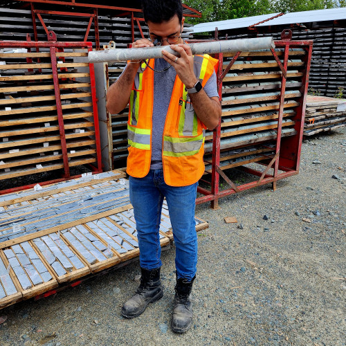 Geologist examining core